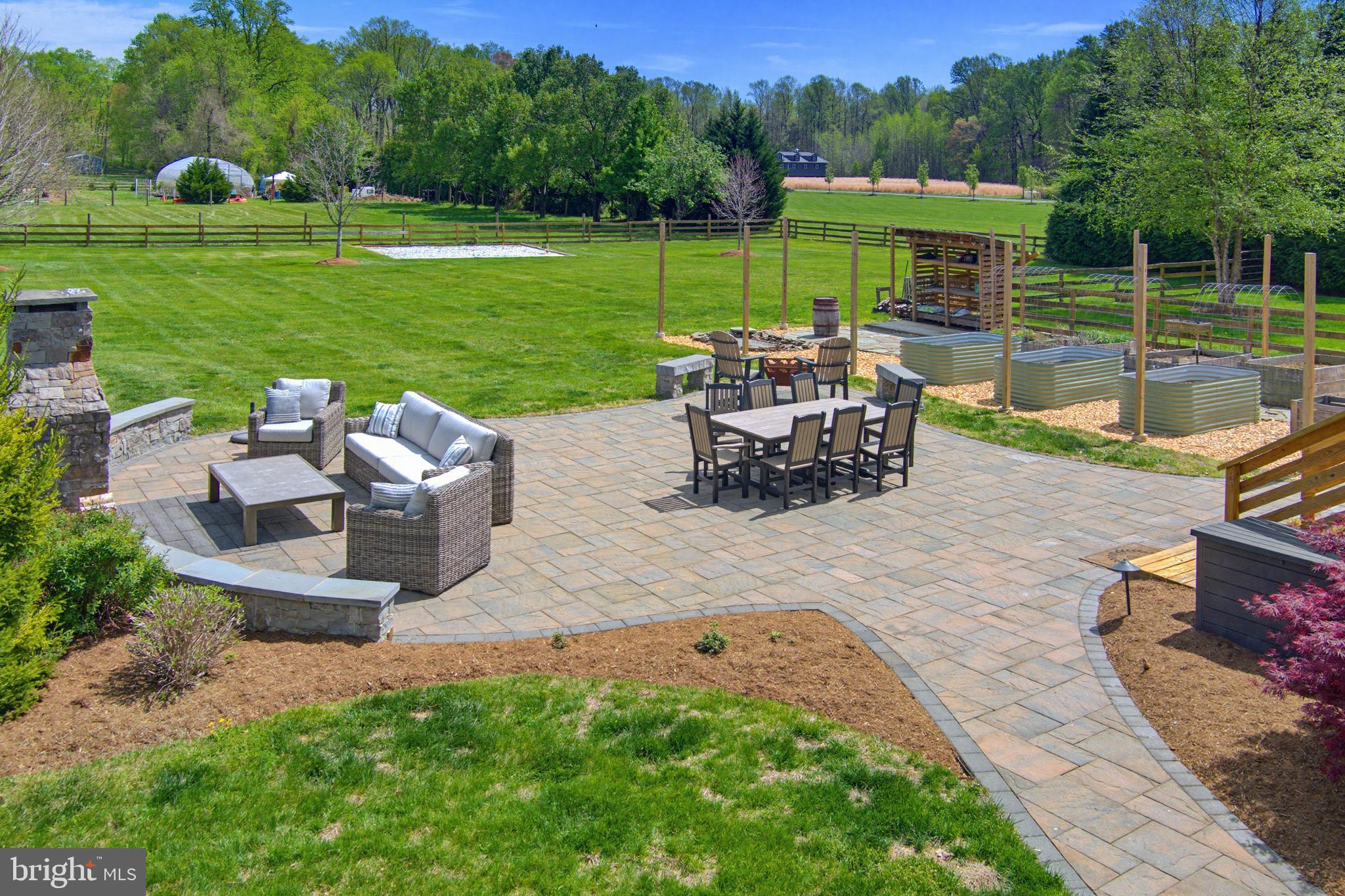 3229 Beards Point Road Davidsonville, MD 21035 - Photo 15 of 69 a view of a swimming pool and lounge chairs in back yard