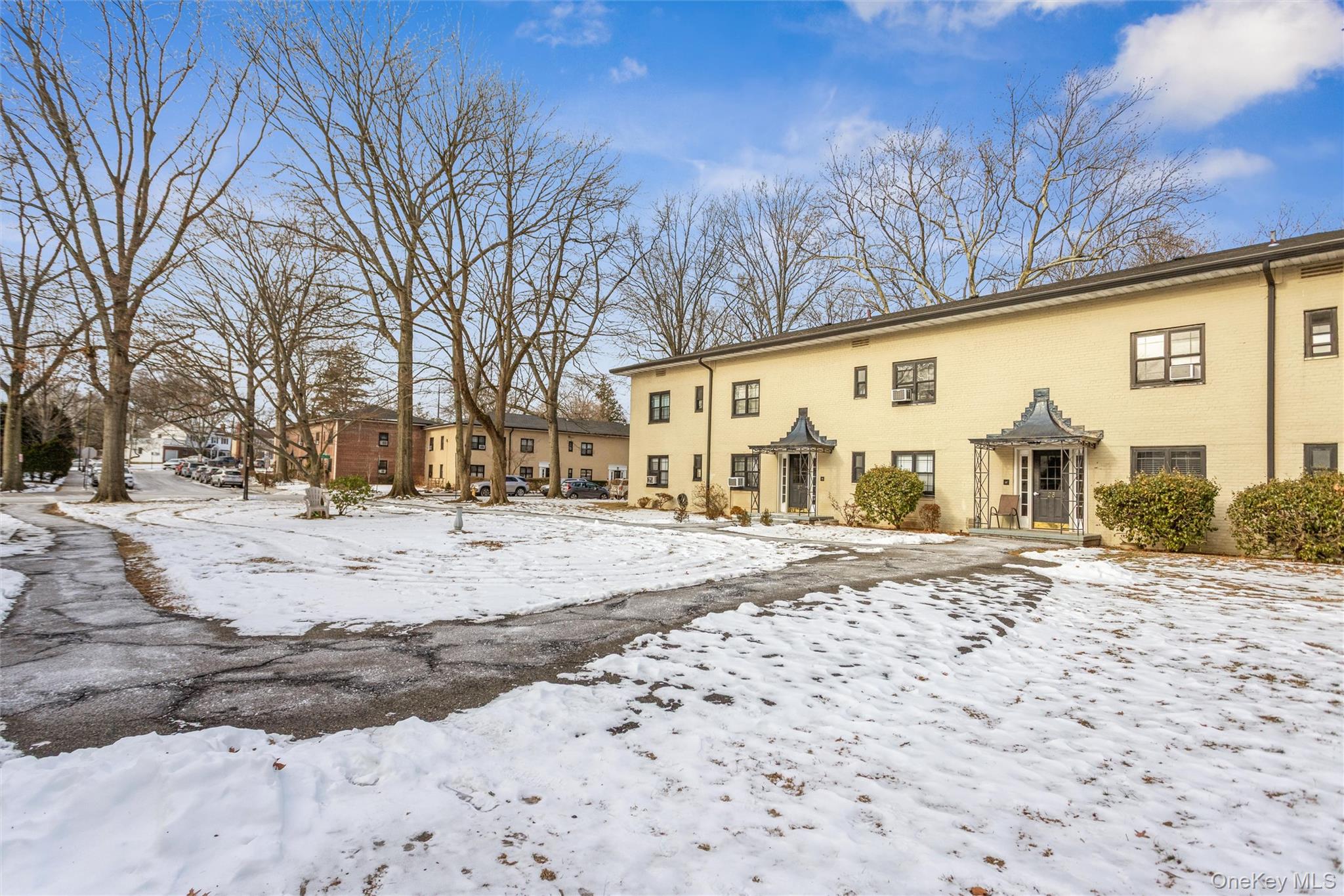 25 Manchester Road, Unit B23 Eastchester, NY 10709 - Photo 19 of 28 a view of a snow on the road