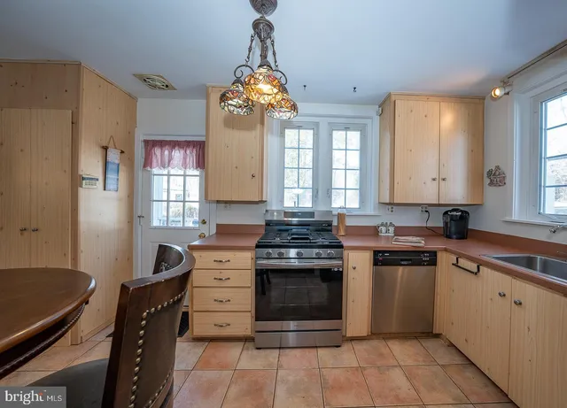 a view of staircase with a rug