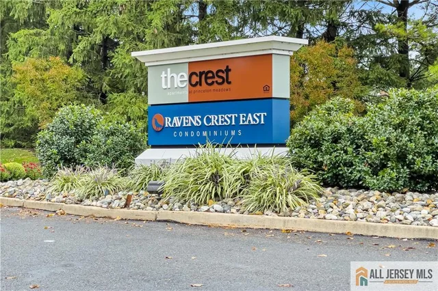 a sign on the side of a street