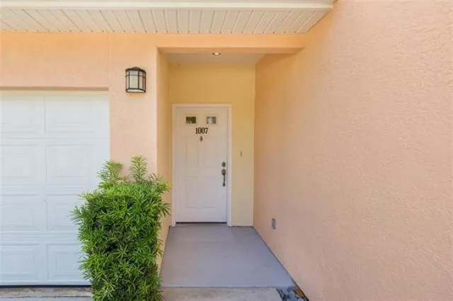 view of a house with a backyard