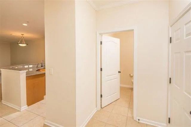 a view of a hallway with two rooms