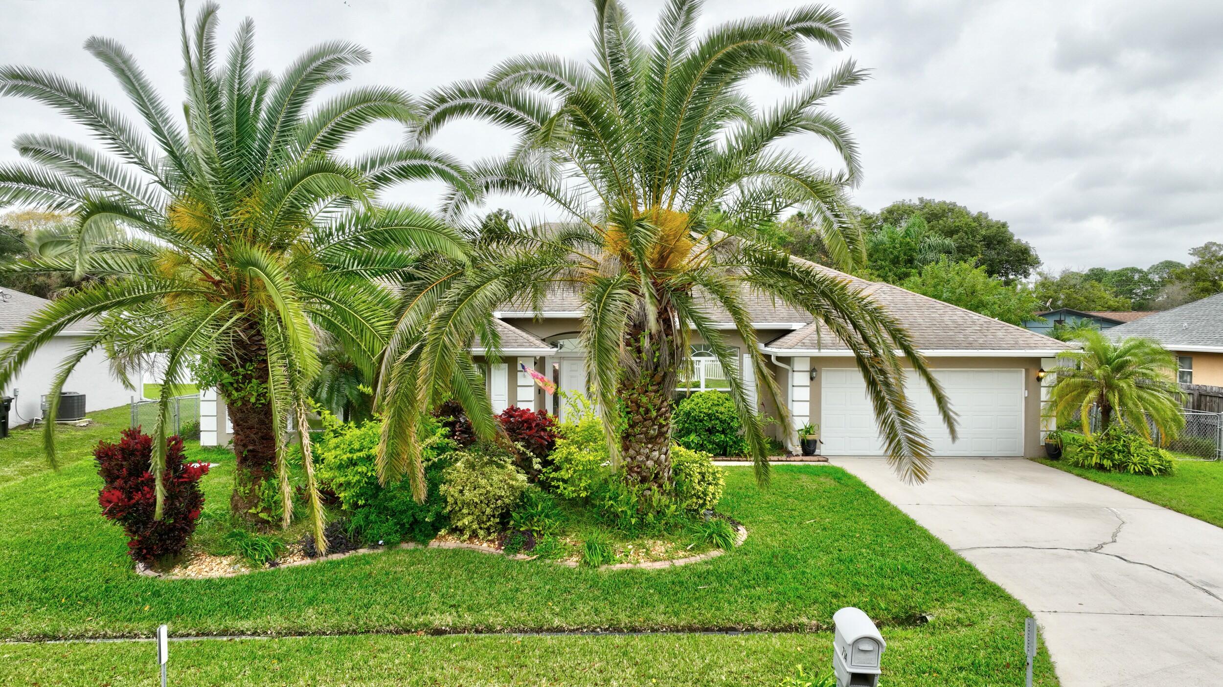 714 Southwest Aster Road Port St. Lucie, FL 34953 - Photo 1 of 59 01_dji_0148_49_50_51_52