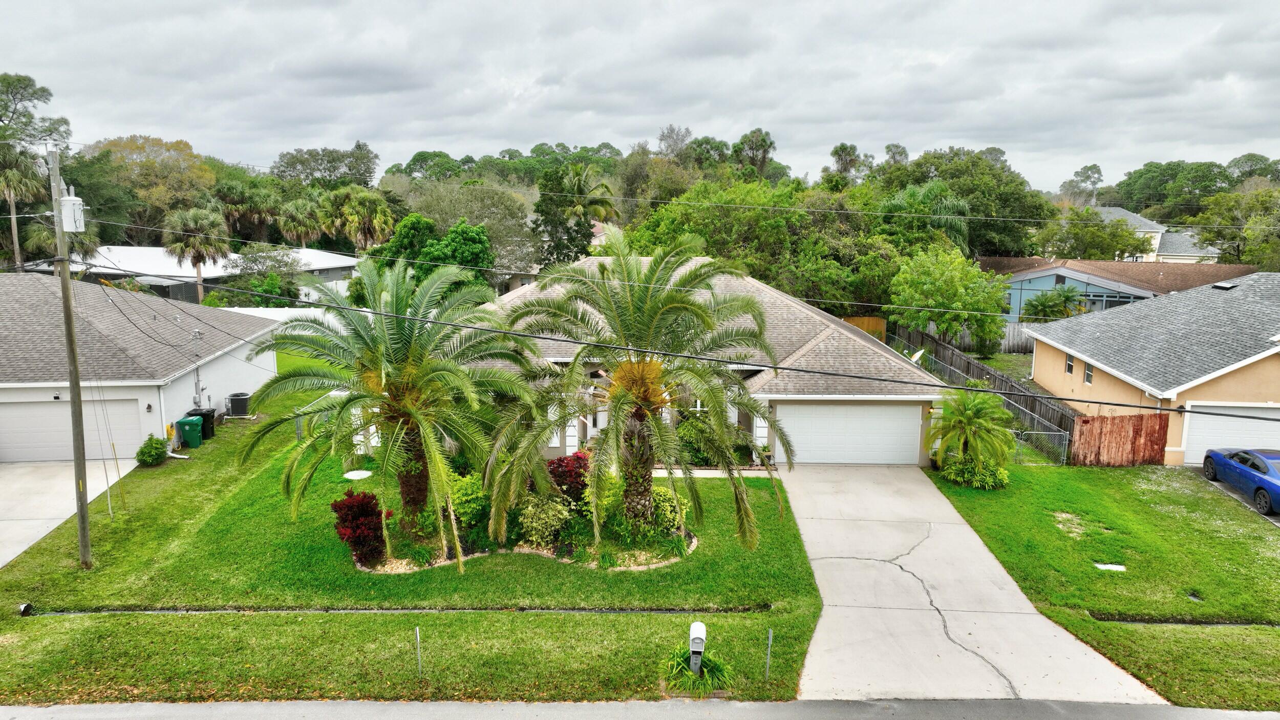 714 Southwest Aster Road Port St. Lucie, FL 34953 - Photo 2 of 59 02_dji_0153_4_5_6_7