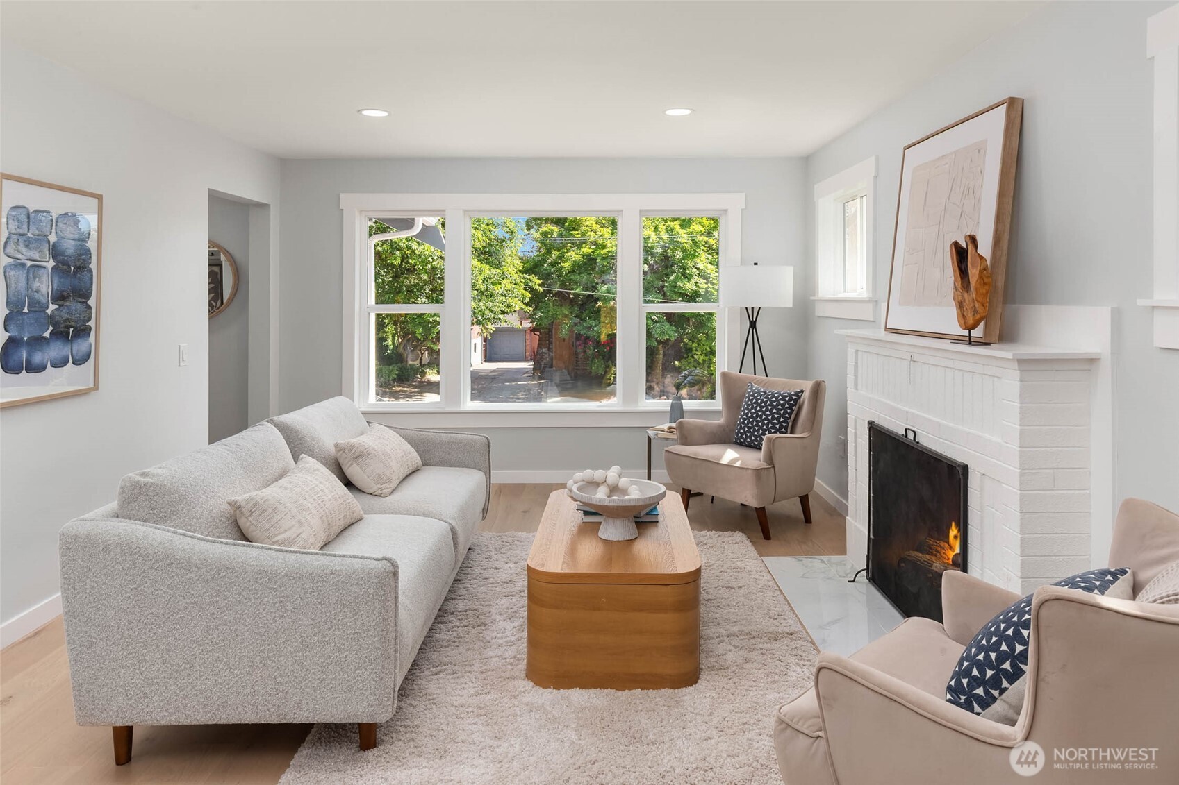 1312 Northeast 70th Street Seattle, WA 98115 - Photo 5 of 36 a living room with furniture and a fireplace