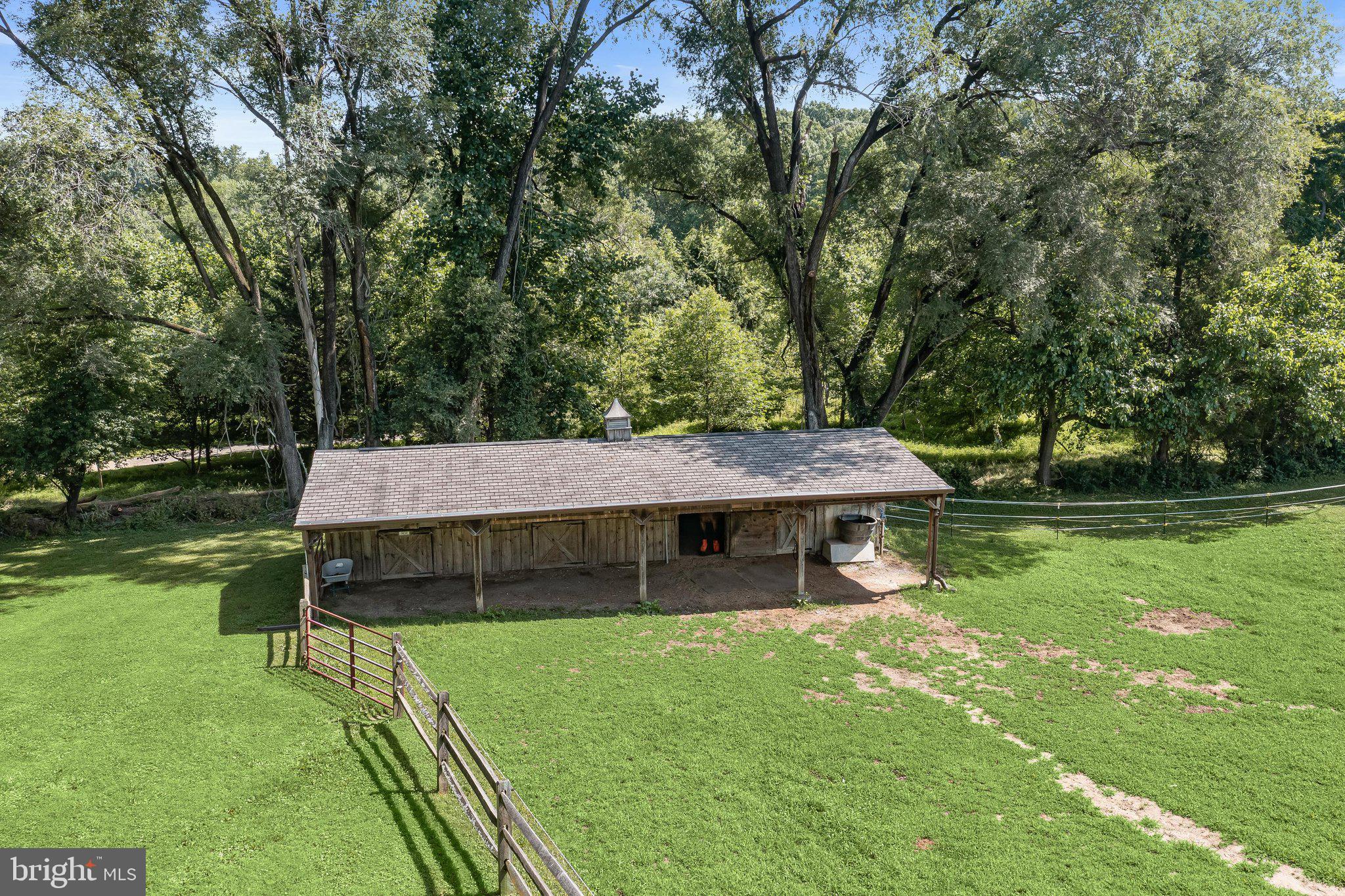 16510 Batchellors Forest Road Olney, MD 20832 - Photo 75 of 107 Aerial View of Paddock with 3 Stalls and Tack Room