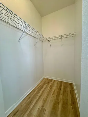 a view of a room with an empty space