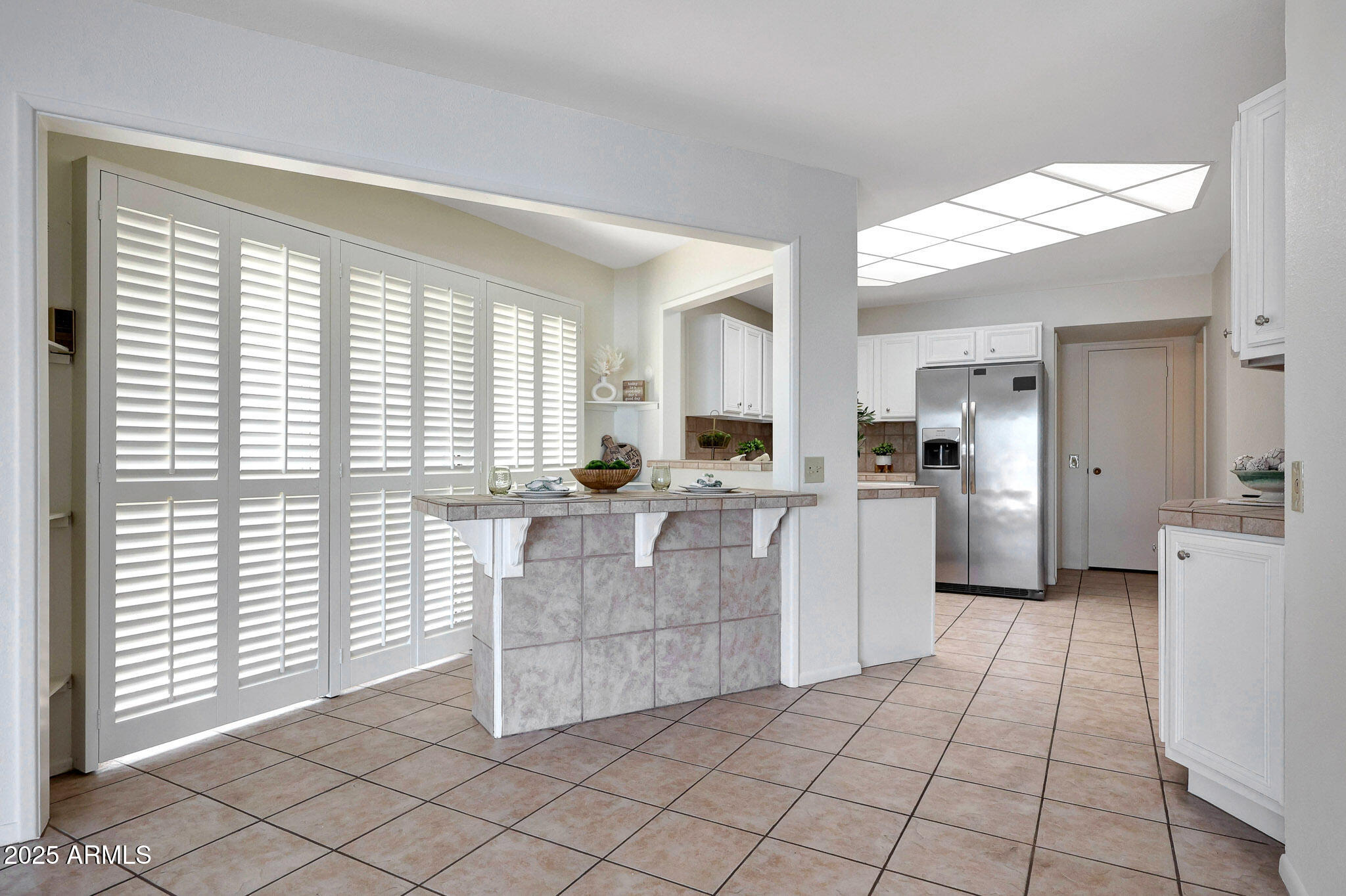 10614 West Emerald Point Sun City, AZ 85351 - Photo 15 of 47 Kitchen Bar Seating