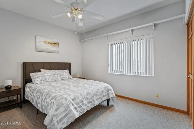 a bath tub sitting next to a shower