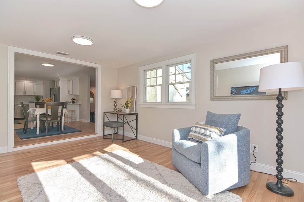 1 Duggan Road Acton, MA 01720 - Photo 11 of 25 a spacious bedroom with a bed and a table in it