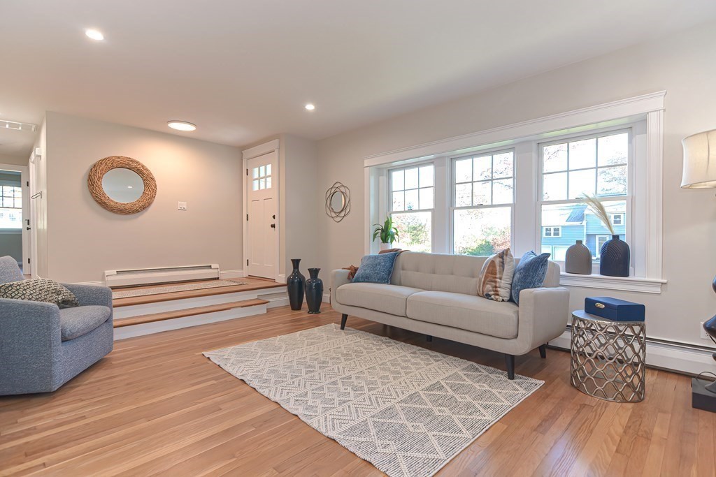 1 Duggan Road Acton, MA 01720 - Photo 4 of 25 a living room with furniture and wooden floor