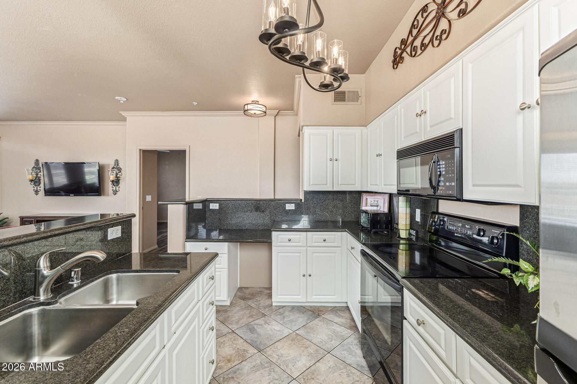 425 West Rio Salado Parkway, Unit 101 Tempe, AZ 85281 - Photo 11 of 33 a kitchen with a sink appliances and cabinets