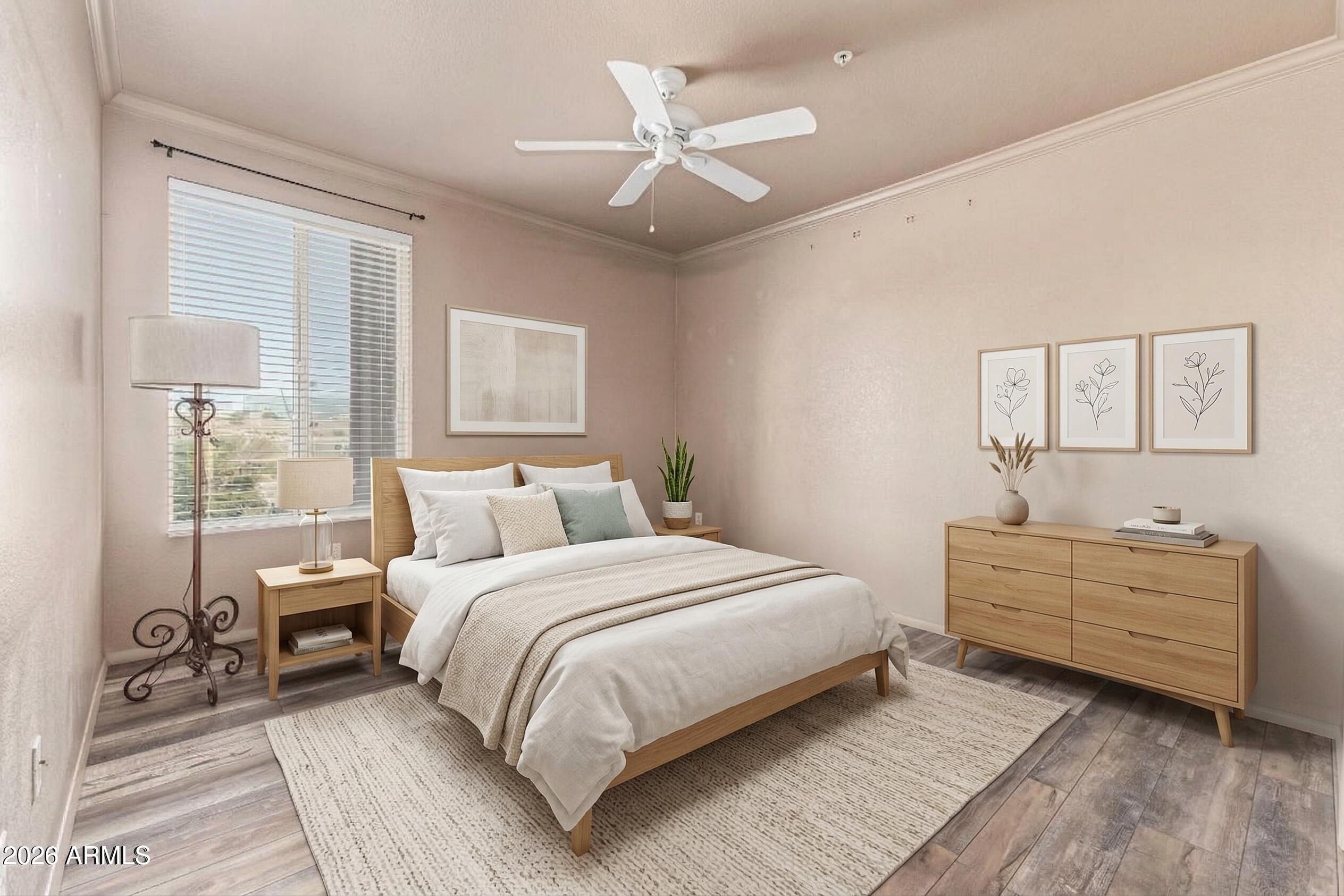 425 West Rio Salado Parkway, Unit 101 Tempe, AZ 85281 - Photo 12 of 32 a bedroom with a large bed and a chandelier