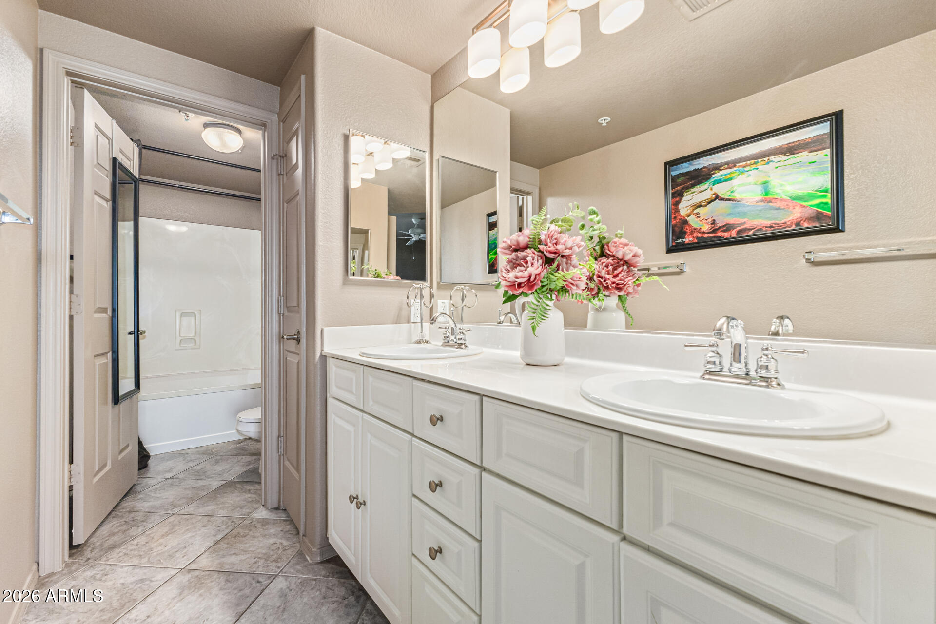425 West Rio Salado Parkway, Unit 101 Tempe, AZ 85281 - Photo 14 of 32 a bathroom with a double vanity sink mirror and next to a window