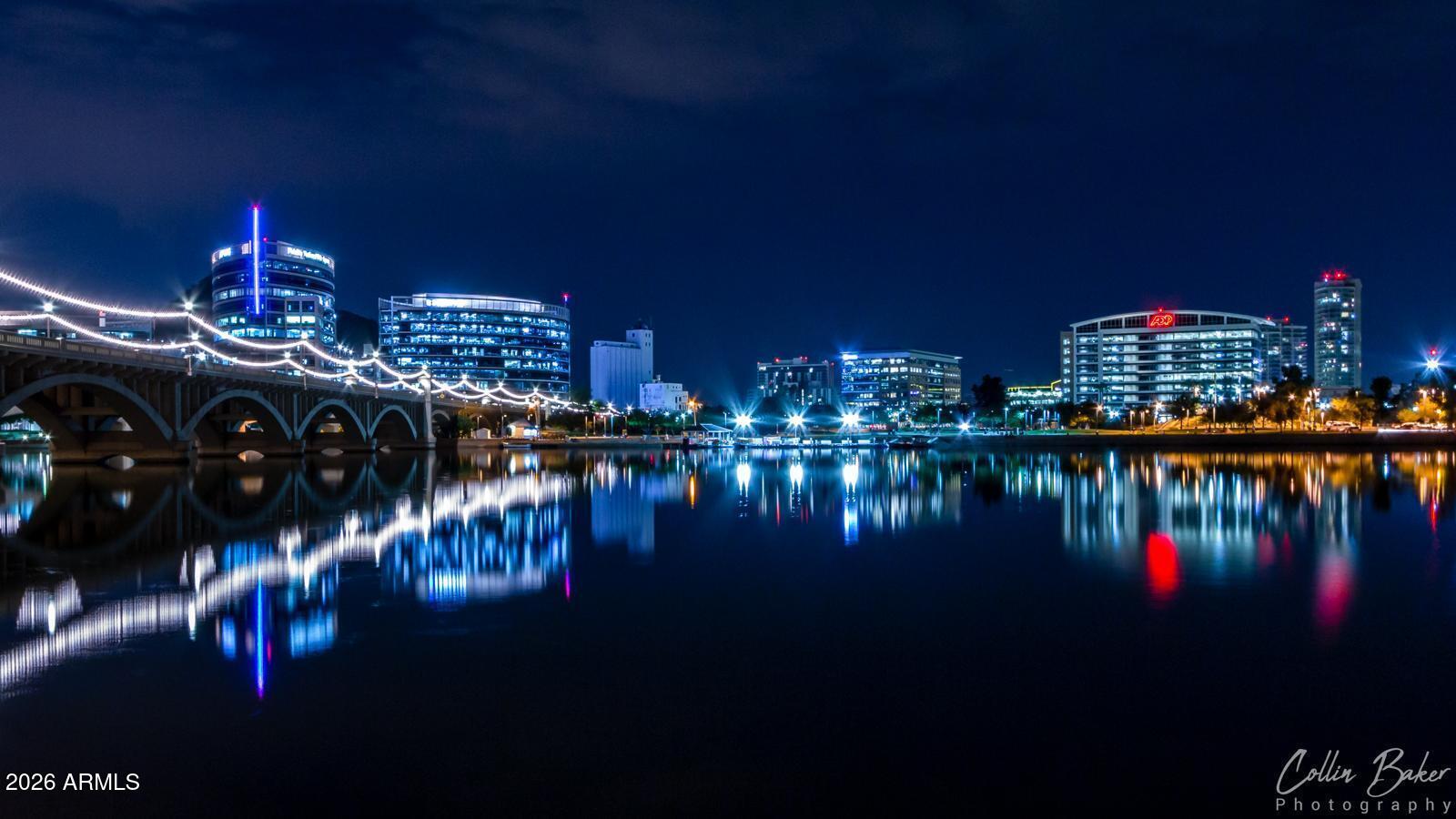 425 West Rio Salado Parkway, Unit 101 Tempe, AZ 85281 - Photo 23 of 32 a lake view with boat and palm trees