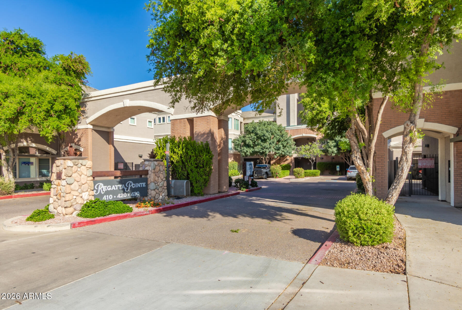 425 West Rio Salado Parkway, Unit 101 Tempe, AZ 85281 - Photo 29 of 32 a view of a garden with a bench