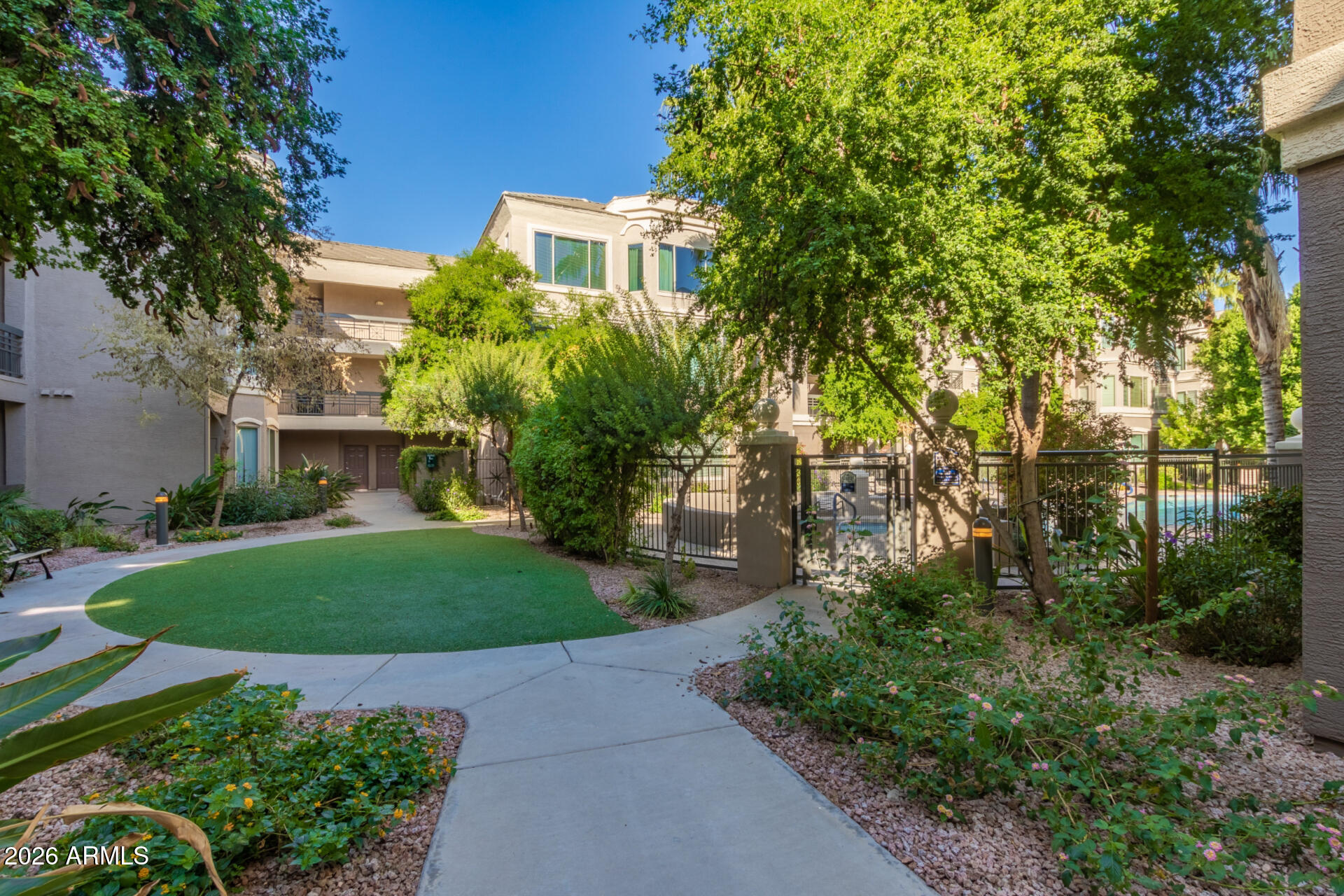 425 West Rio Salado Parkway, Unit 101 Tempe, AZ 85281 - Photo 30 of 32 a front view of a house with garden