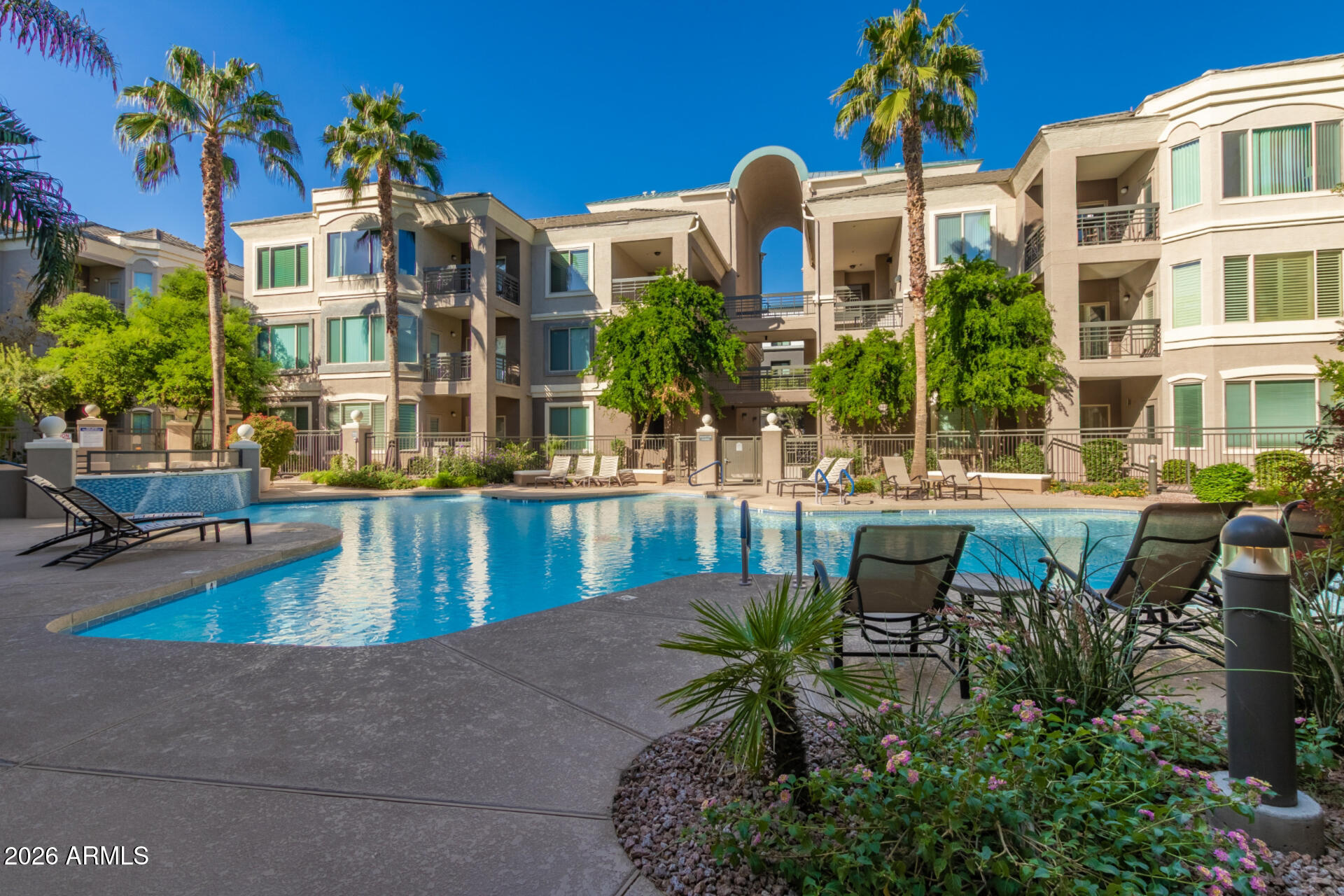 425 West Rio Salado Parkway, Unit 101 Tempe, AZ 85281 - Photo 32 of 32 a view of a swimming pool with outdoor seating