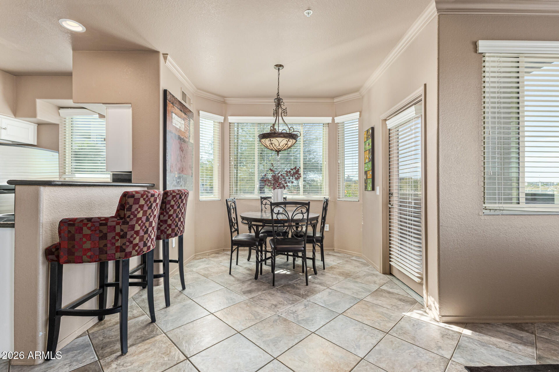 425 West Rio Salado Parkway, Unit 101 Tempe, AZ 85281 - Photo 8 of 33 a dining room filled with furniture and window