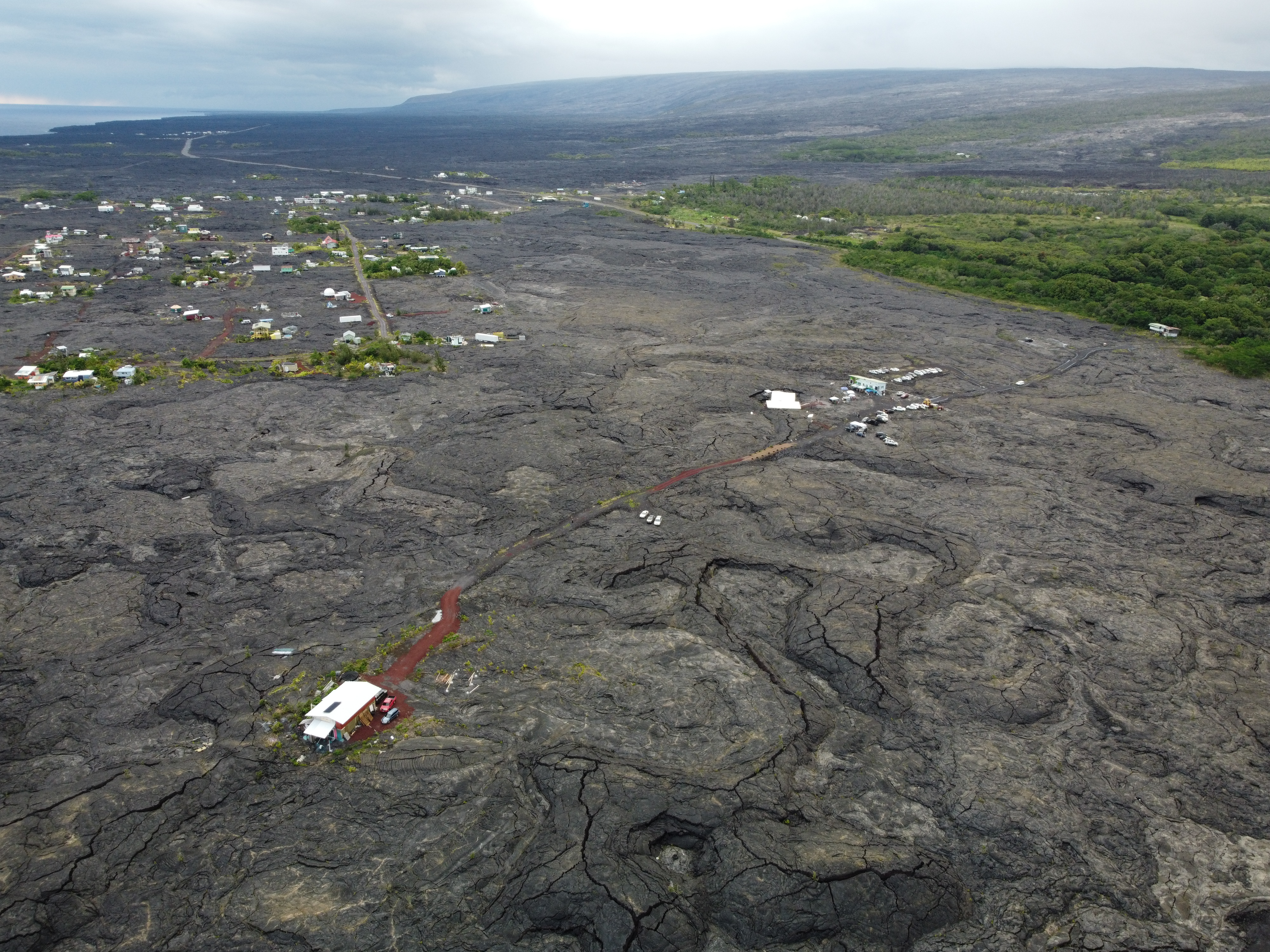 12-4901 Kaimu-Chain Of Craters Road Pahoa, HI 96778 - Photo 4 of 15 a view of a big yard with lots of green space