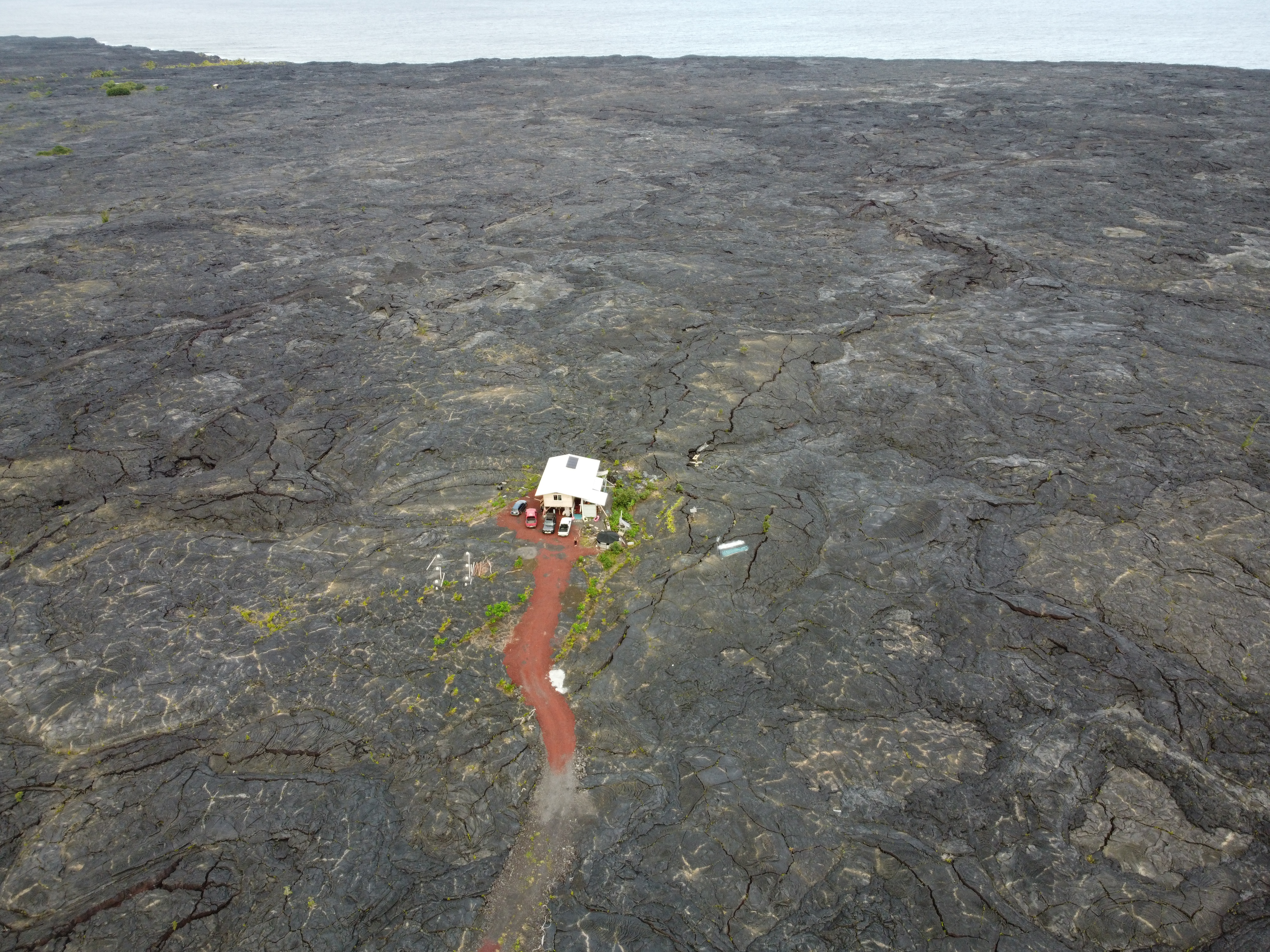 12-4901 Kaimu-Chain Of Craters Road Pahoa, HI 96778 - Photo 5 of 15 a view of a dry yard