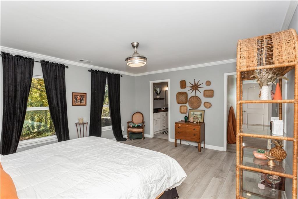 1184 Metropolitan Parkway Southwest Atlanta, GA 30310 - Photo 13 of 26 a bedroom with a bed and a window