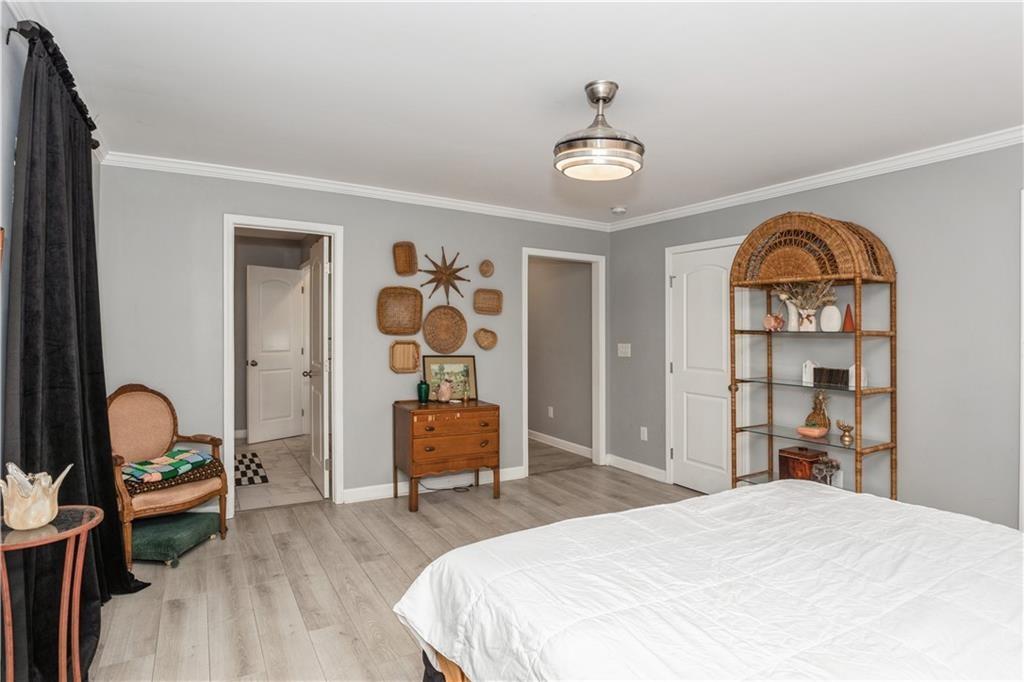 1184 Metropolitan Parkway Southwest Atlanta, GA 30310 - Photo 14 of 26 a bedroom with furniture and a window