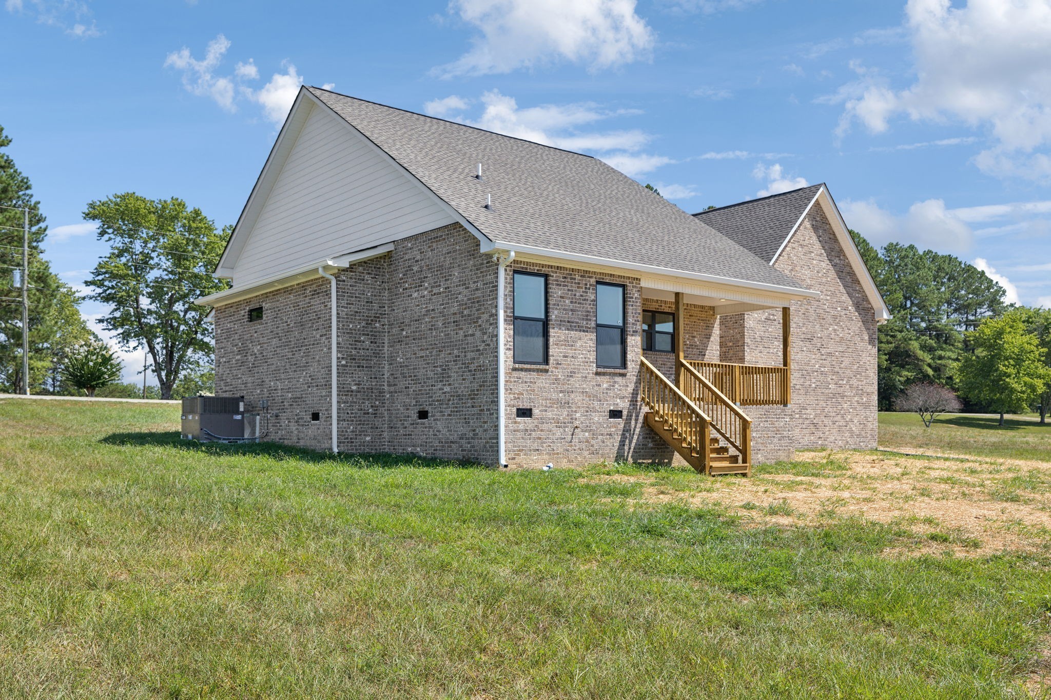 47 Long Branch Road Lawrenceburg, TN 38464 - Photo 40 of 49 a view of a house with backyard and garden