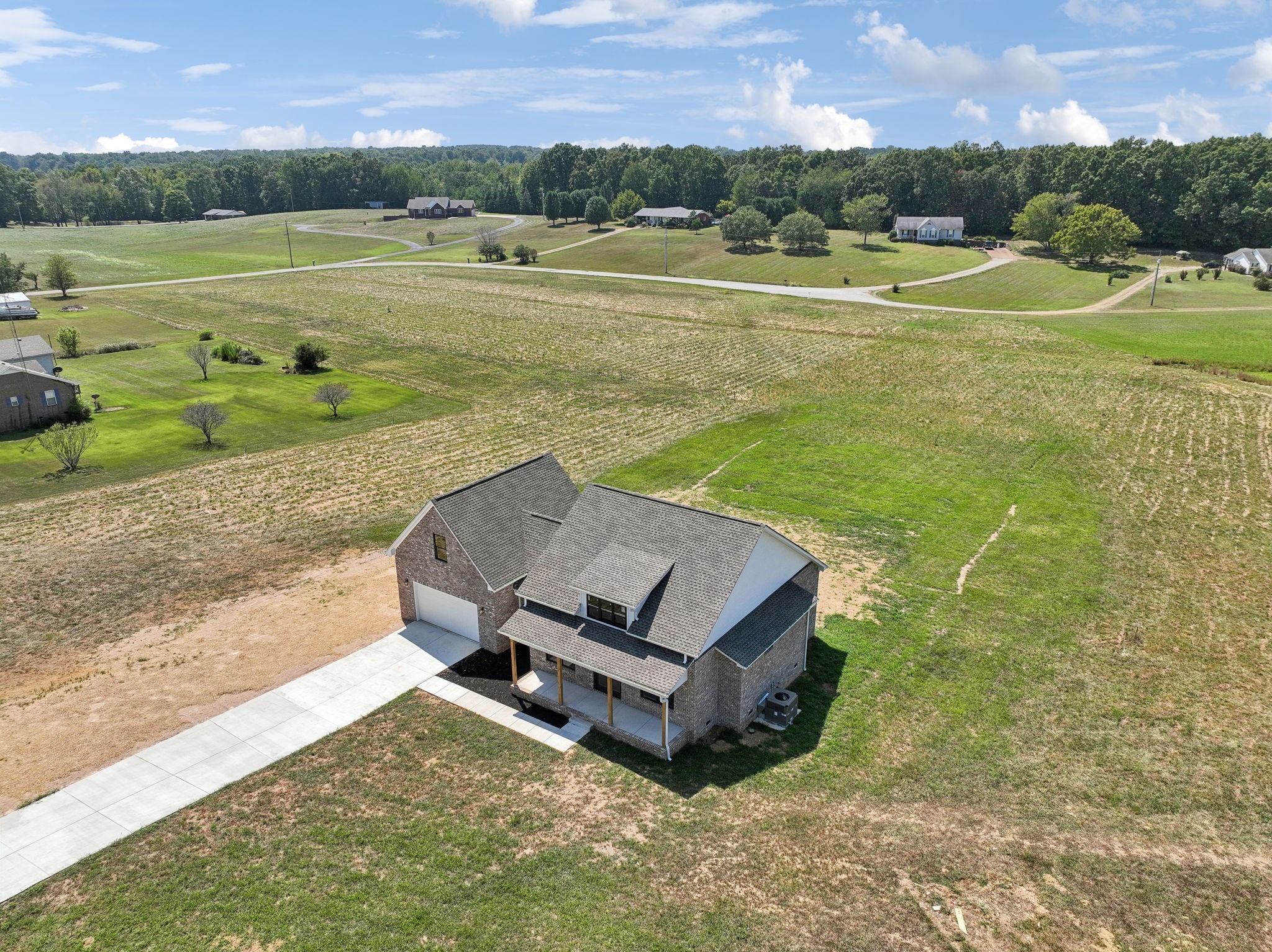 47 Long Branch Road Lawrenceburg, TN 38464 - Photo 42 of 49 an aerial view of a house with a yard and lake view