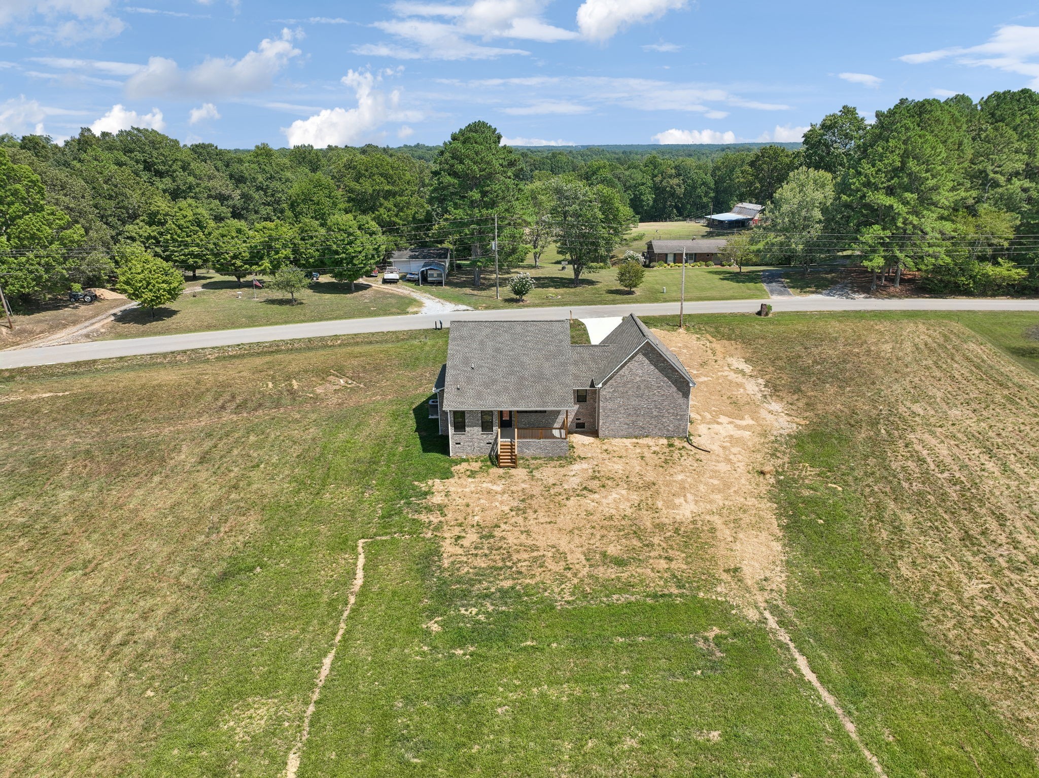 47 Long Branch Road Lawrenceburg, TN 38464 - Photo 45 of 49 a view of a lake with a yard