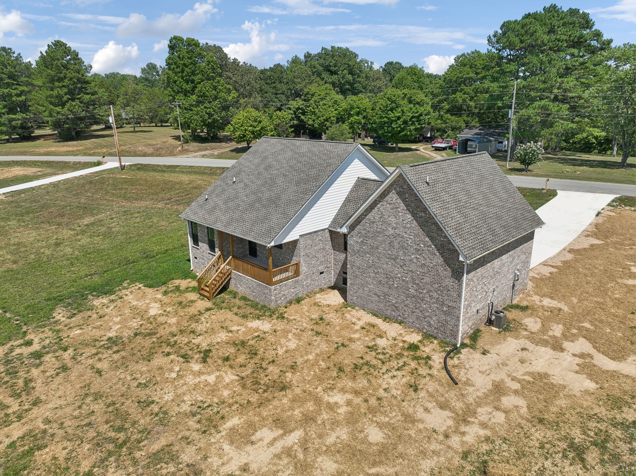 47 Long Branch Road Lawrenceburg, TN 38464 - Photo 46 of 49 a view of a house with a yard and large tree