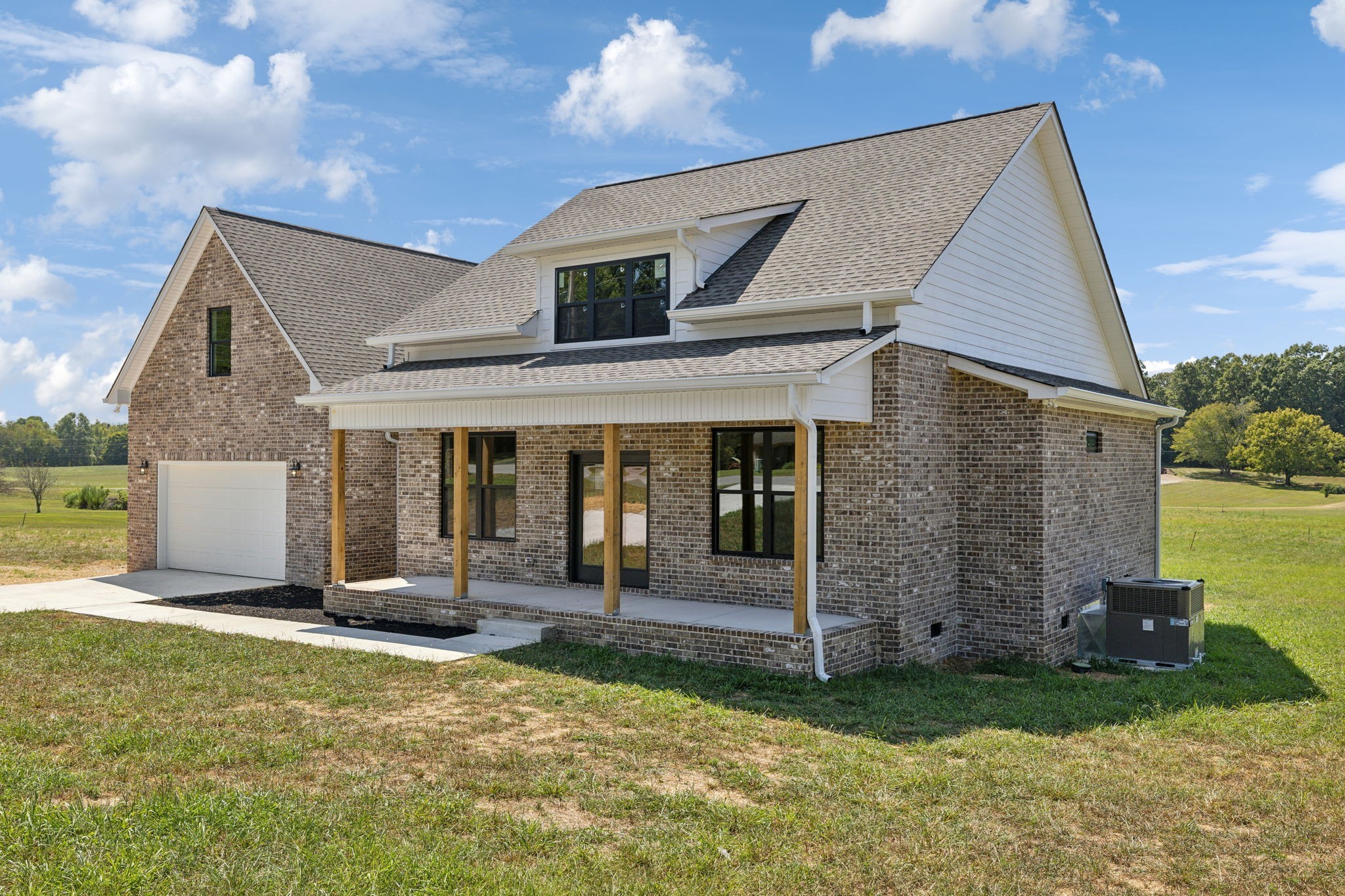 47 Long Branch Road Lawrenceburg, TN 38464 - Photo 6 of 49 a view of a house with backyard porch and garden