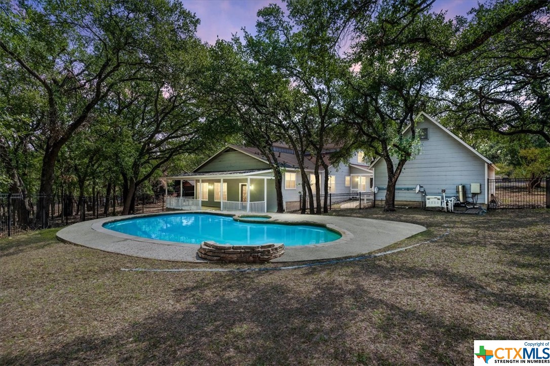 a front view of a house with yard