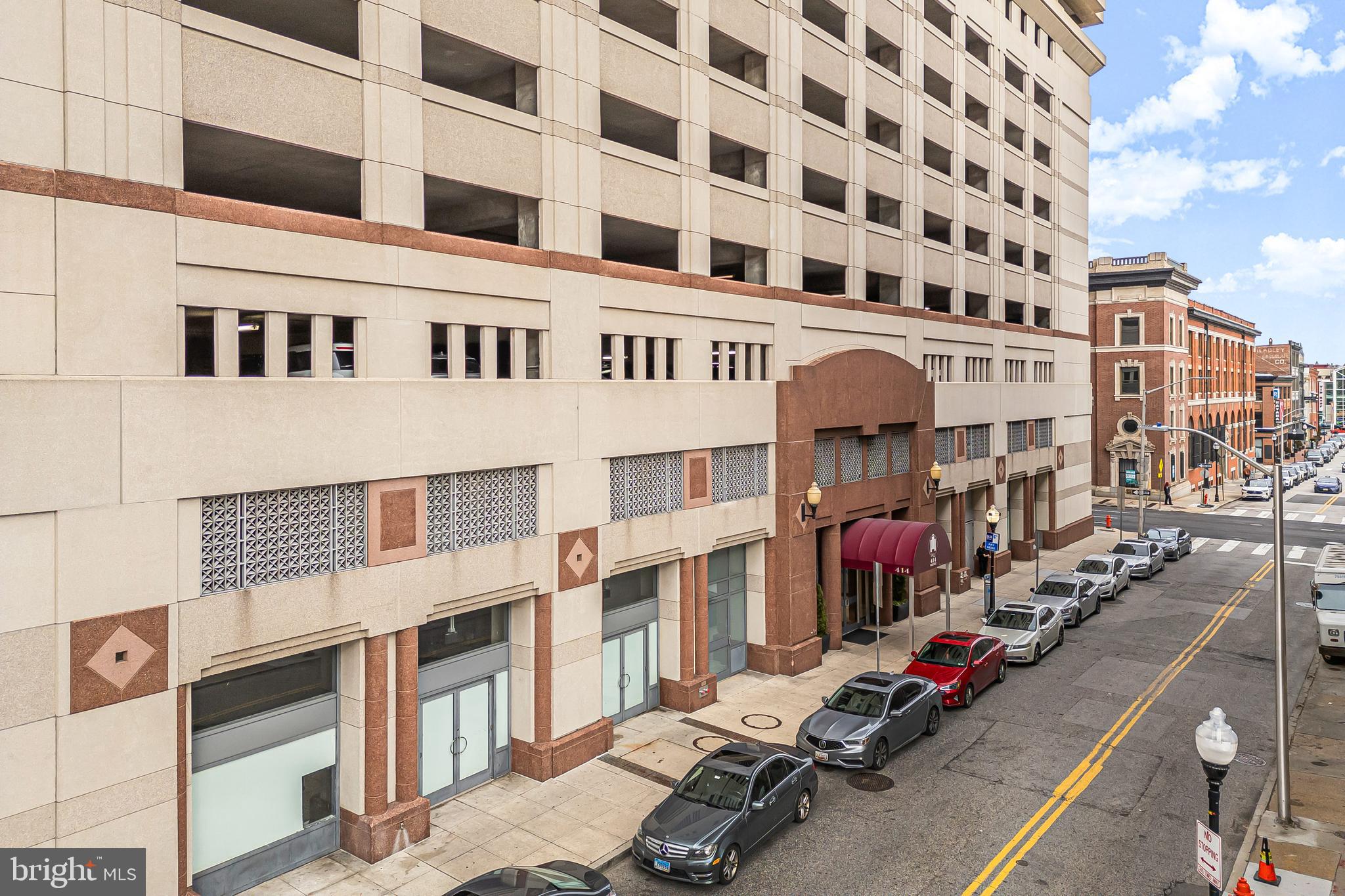 414 Water Street, Unit 1501 Baltimore, MD 21202 - Photo 2 of 35 a view of a building with many windows