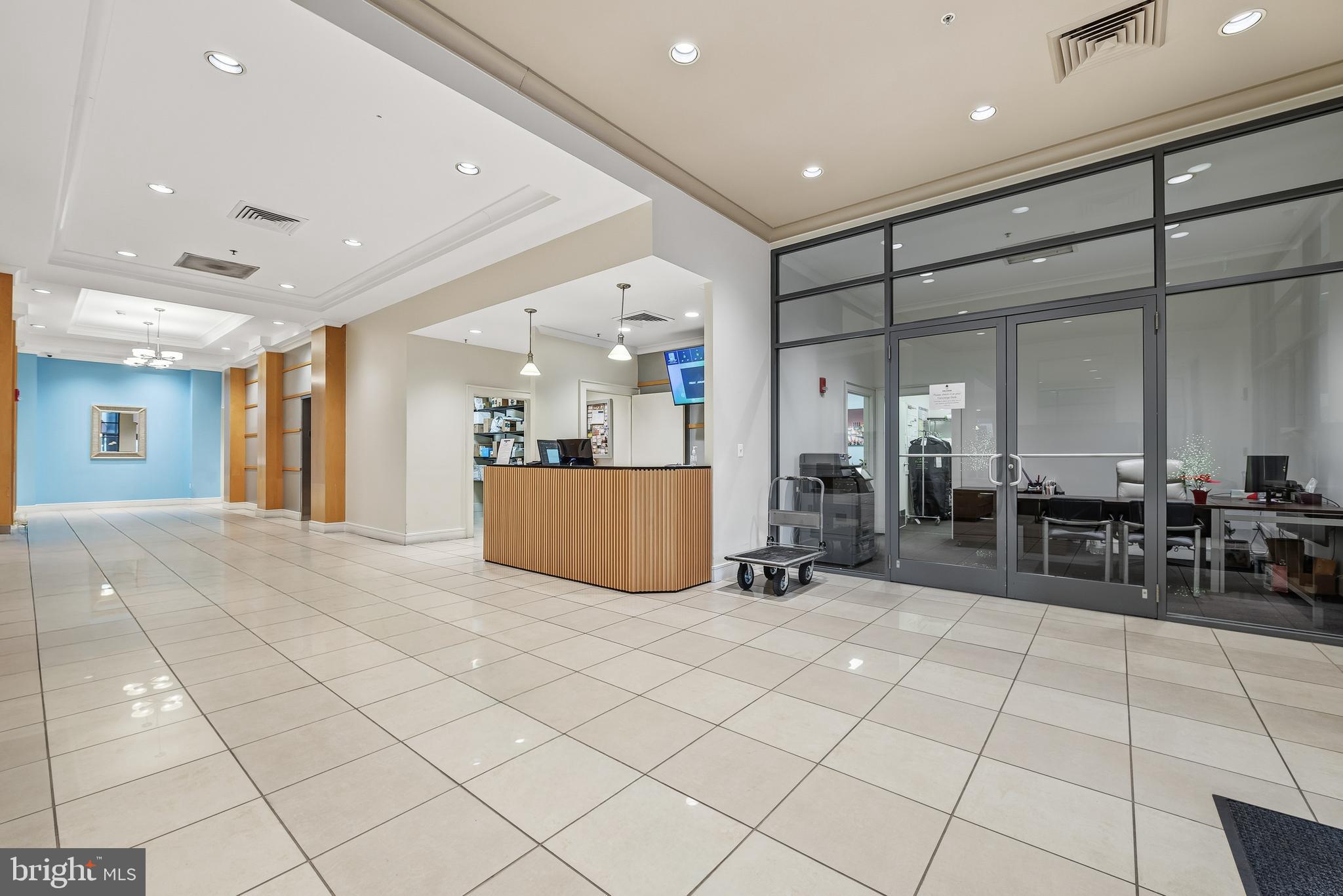 414 Water Street, Unit 1501 Baltimore, MD 21202 - Photo 5 of 35 a view of a room with gym equipment
