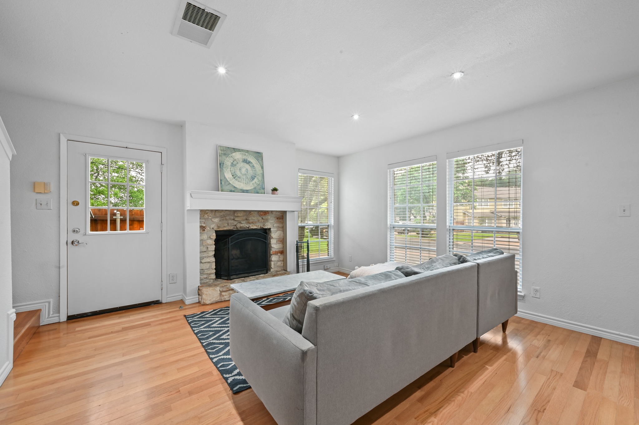 1504 Allen Road, Unit B Austin, TX 78746 - Photo 5 of 22 Living Room with Wood Burning Fireplace
