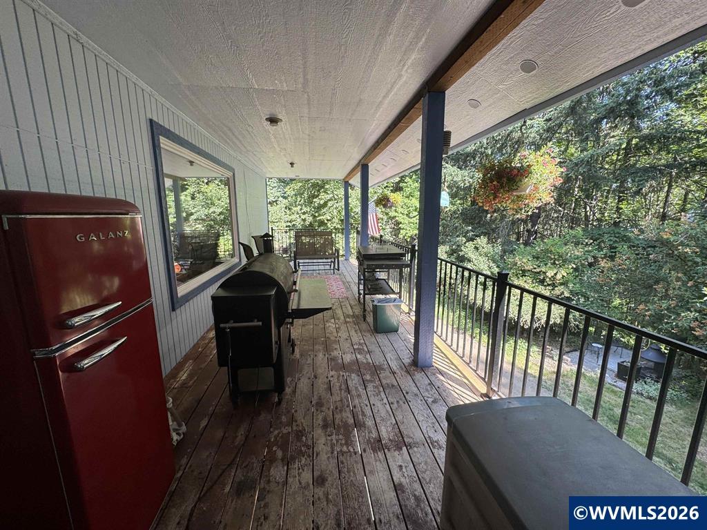 6100 Teal Creek Road Dallas, OR 97338 - Photo 30 of 41 a view of a living room with furniture window and outside view