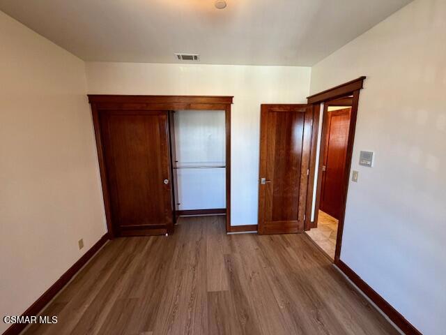 828 East Thompson Boulevard, Unit D Ventura, CA 93001 - Photo 12 of 24 a view of a room with wooden floor