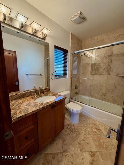 828 East Thompson Boulevard, Unit D Ventura, CA 93001 - Photo 14 of 24 a bathroom with a granite countertop sink toilet and shower