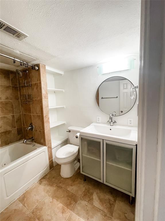 4224 Rawlins Street Dallas, TX 75219 - Photo 16 of 28 a bathroom with a sink toilet and shower