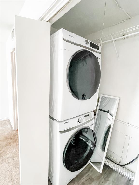 4224 Rawlins Street Dallas, TX 75219 - Photo 27 of 28 a utility room with dryer and washer