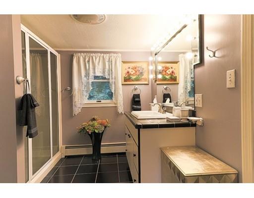 32 Woodland Road Billerica, MA 01821 - Photo 11 of 19 a kitchen with a sink and a refrigerator