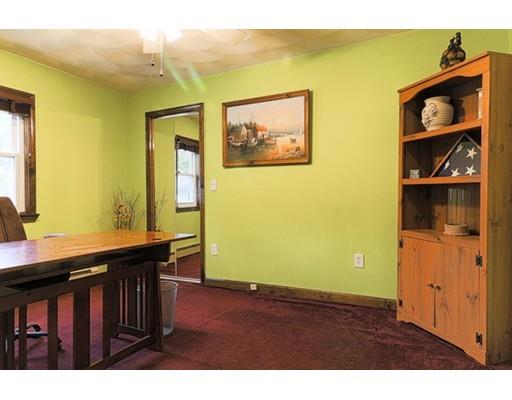 32 Woodland Road Billerica, MA 01821 - Photo 13 of 19 a view of a room with wooden floor and window