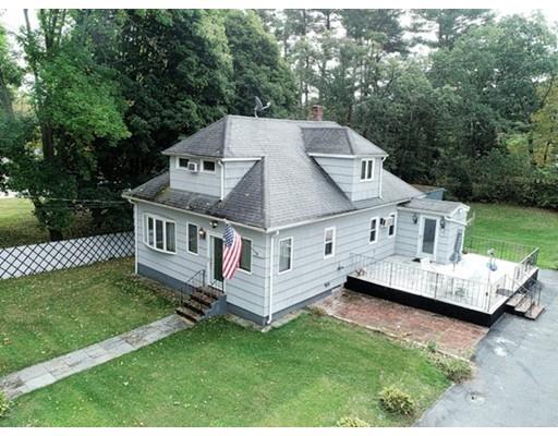 32 Woodland Road Billerica, MA 01821 - Photo 15 of 19 a view of a house with a big yard