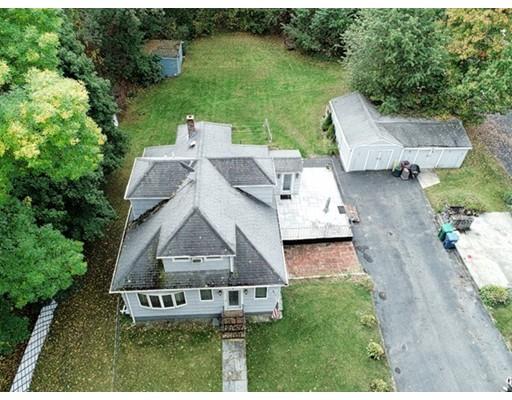 32 Woodland Road Billerica, MA 01821 - Photo 17 of 19 a view of a house with a yard