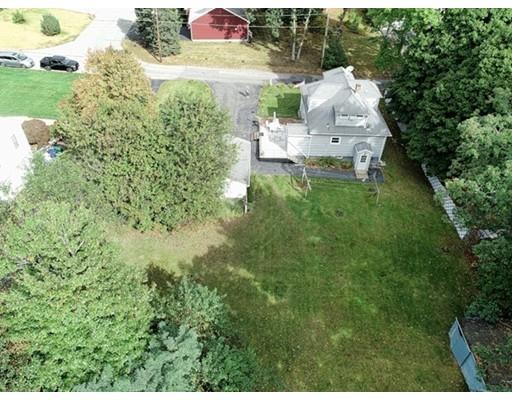 32 Woodland Road Billerica, MA 01821 - Photo 18 of 19 a view of a house with a yard