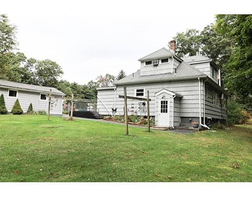 32 Woodland Road Billerica, MA 01821 - Photo 19 of 19 a view of a house with a yard and sitting area
