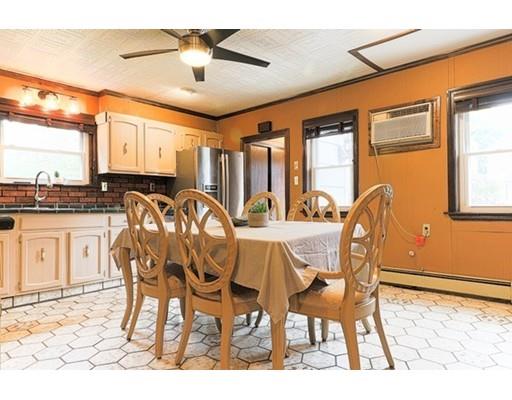 32 Woodland Road Billerica, MA 01821 - Photo 5 of 19 a dining room with furniture and window