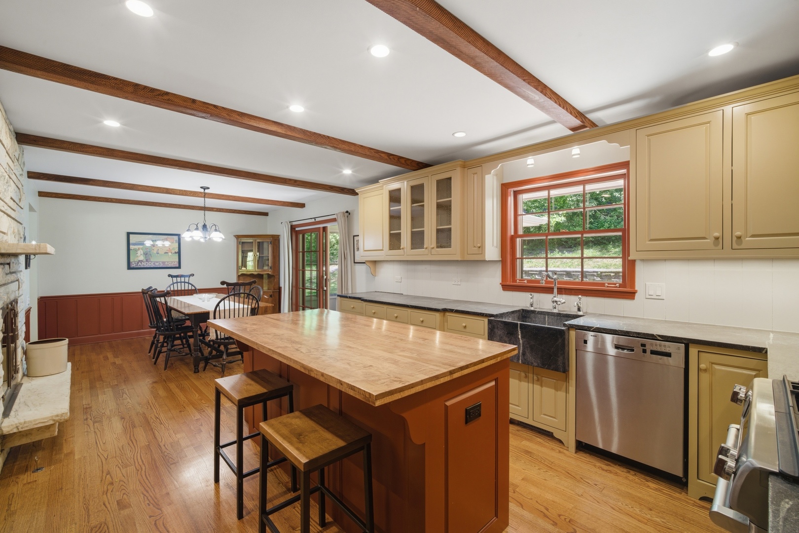 237 Beachview Lane North Barrington, IL 60010 - Photo 11 of 26 a kitchen with a table chairs and wooden floor
