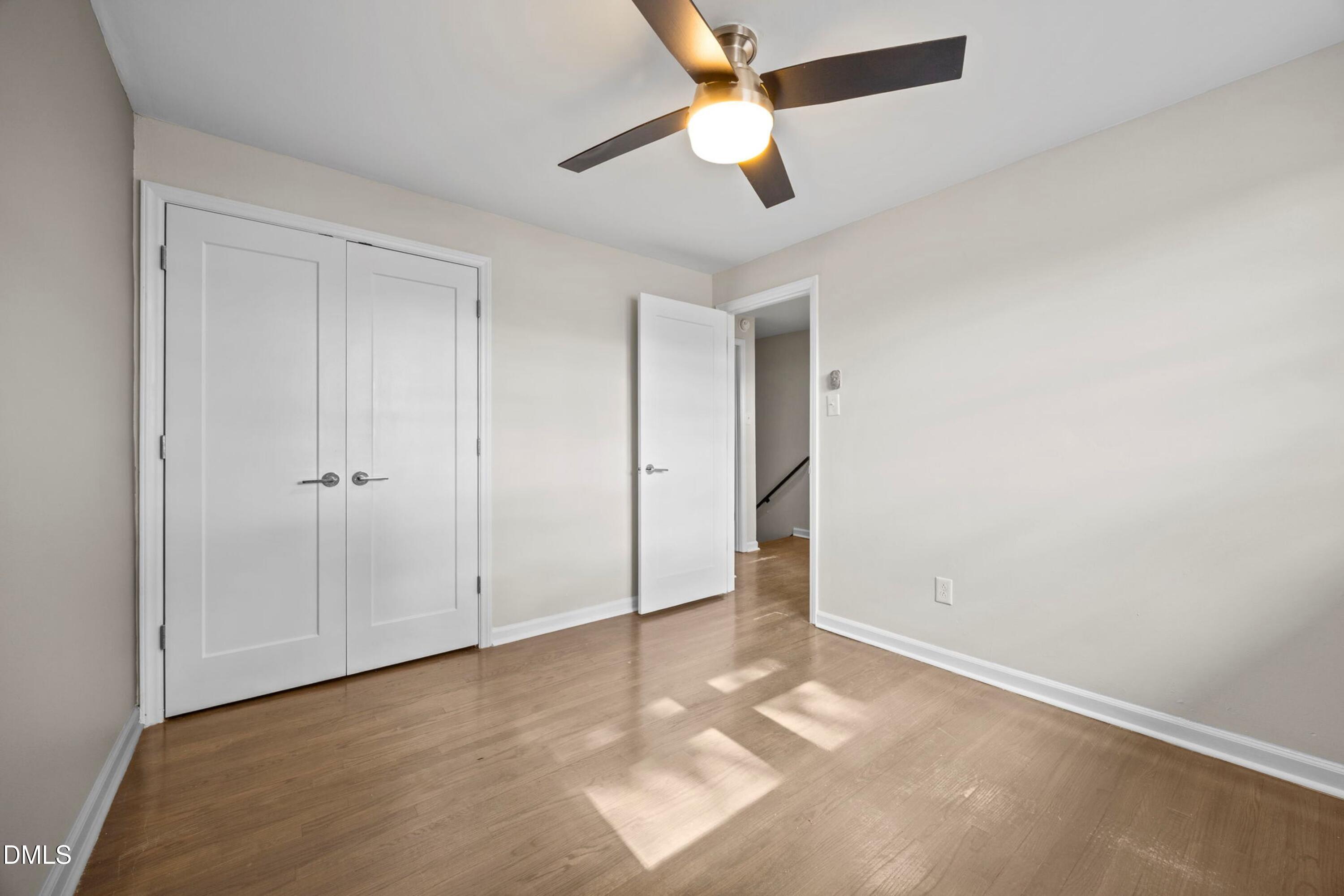 1618 Boyer Street Raleigh, NC 27610 - Photo 18 of 24 an empty room with closet and fan